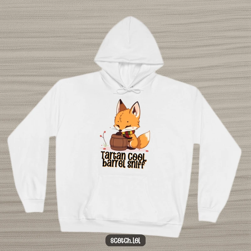 Funny fox cub hoodie, cozy and warm, featuring a fox cub in a scarf sniffing a barrel, perfect for forest lovers.